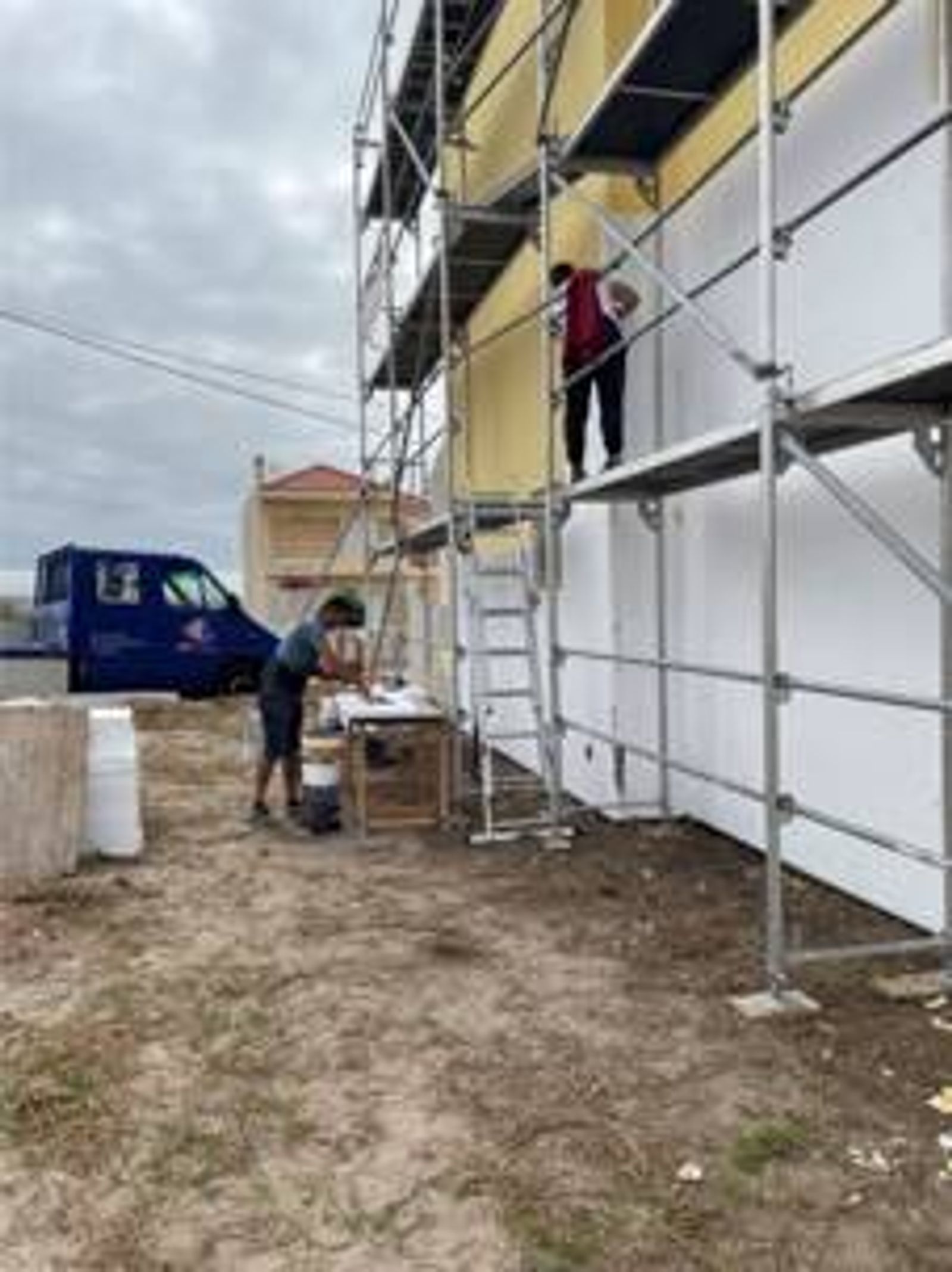 Colocação de isolamento térmico na empena norte